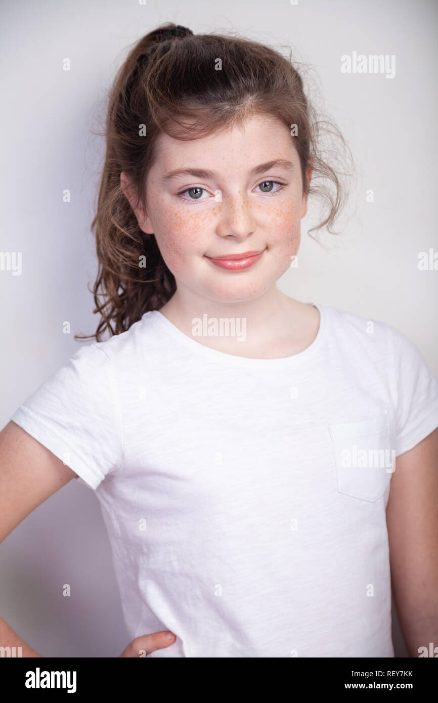 Portrait of pretty Scottish 10 year old girl with freckles. Stock Photo