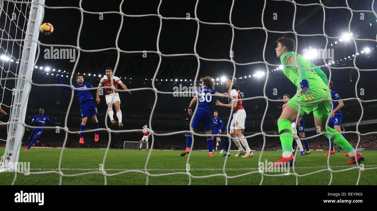 Arsenal's Sokratis Papastathopoulos heads wide of Chelsea goalkeeper