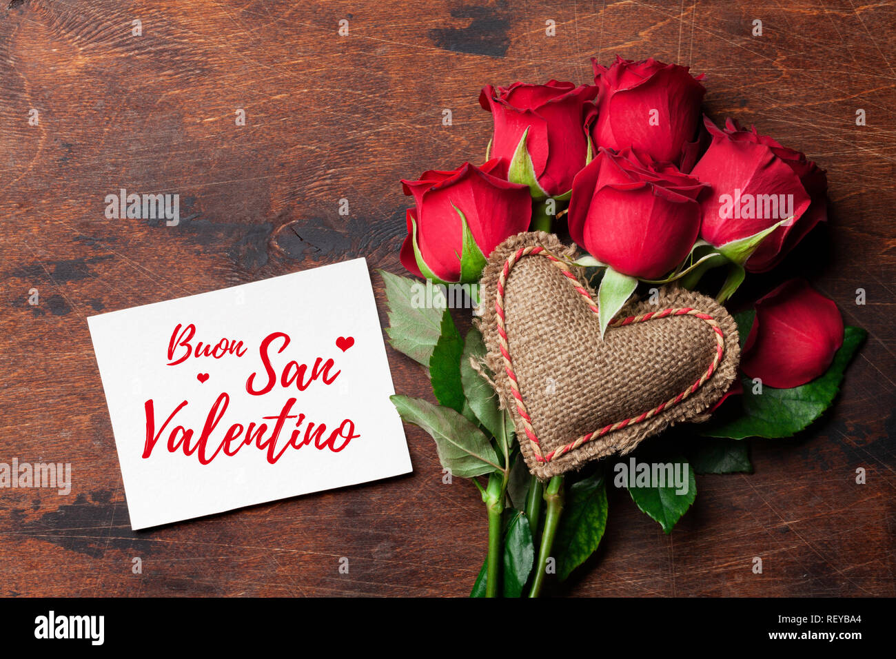 Valentine's day greeting card with red rose flowers bouquet and