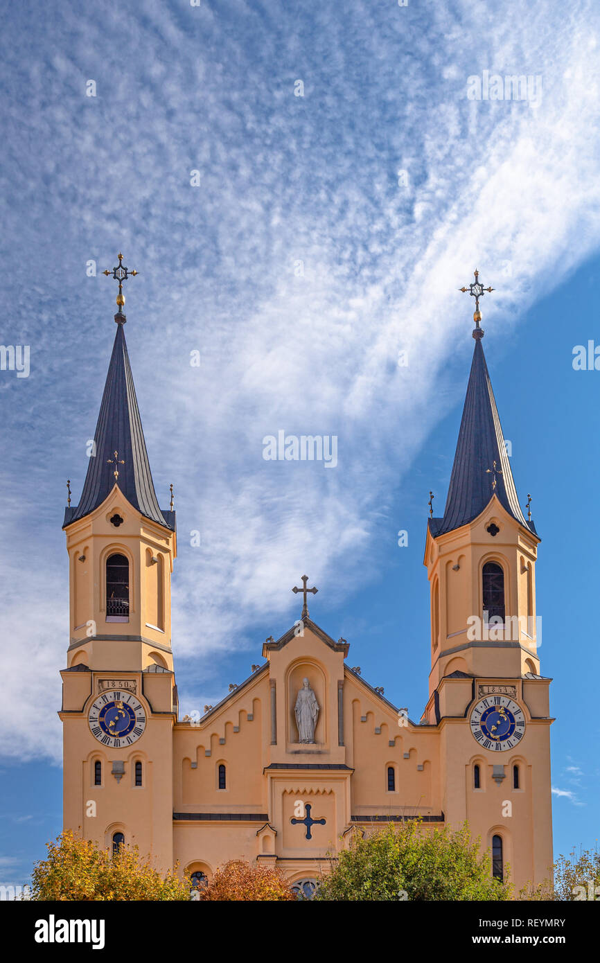 Facade and towers of the parish church in Bruneck, South Tyrol Stock Photo