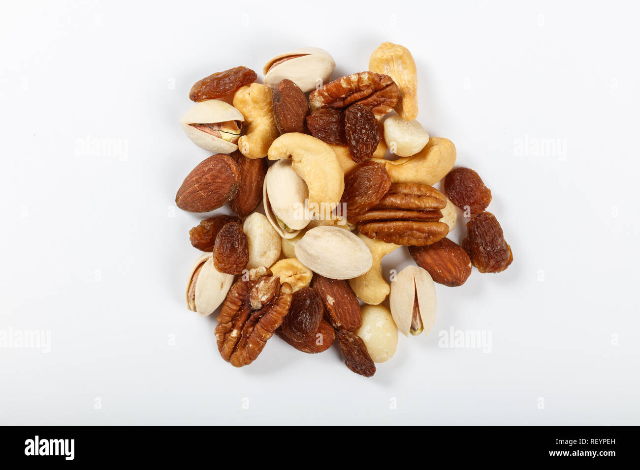 Mixed nuts snacks  isolated on white background. Stock Photo