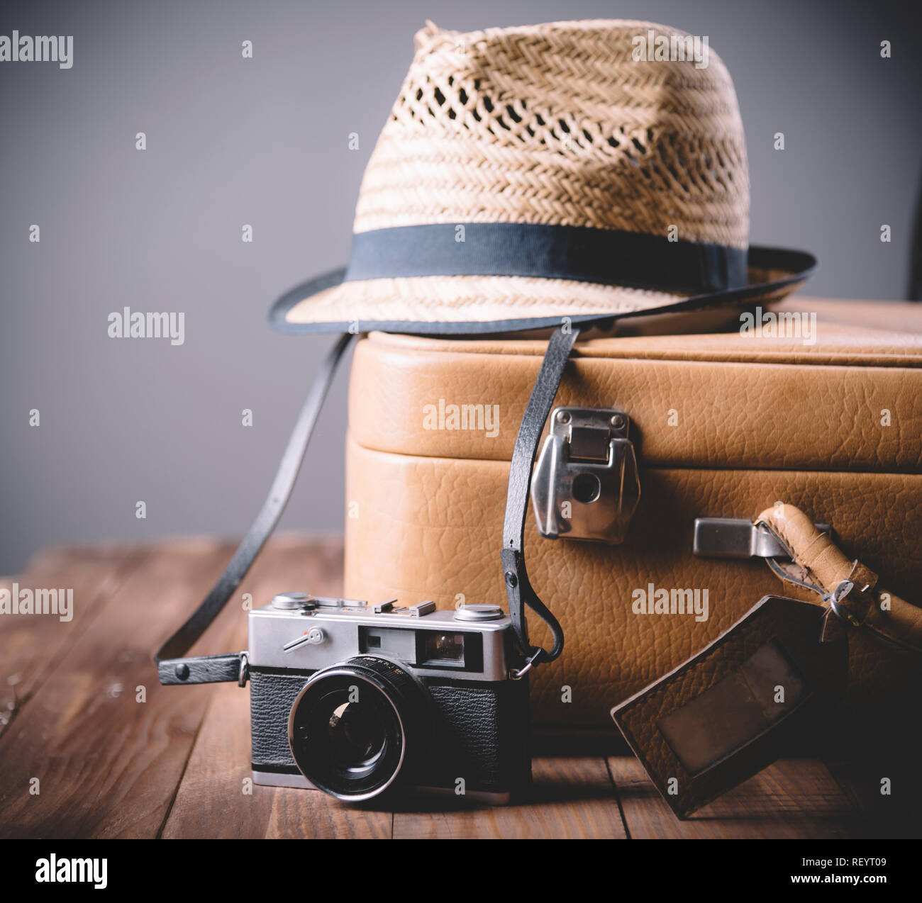 retro camera on wooden background still 