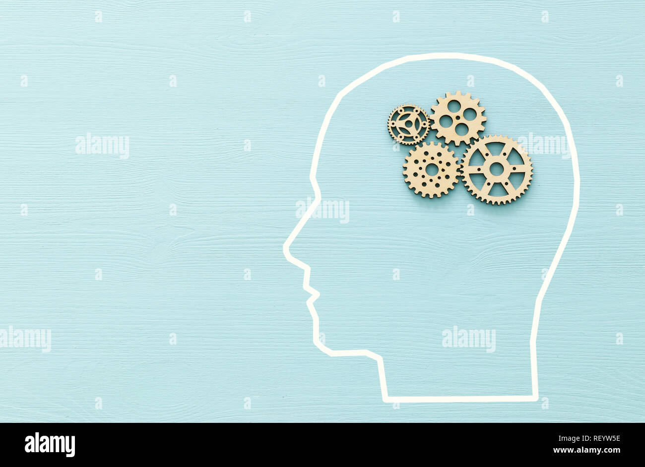 Brain order made from wooden cogwheels into human head. Concept of ...