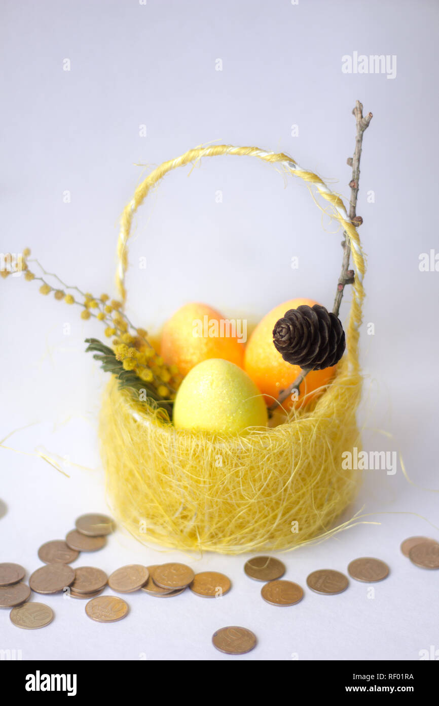 painted eggs in basket isolated on white backround. Easter eggs. Happy ...