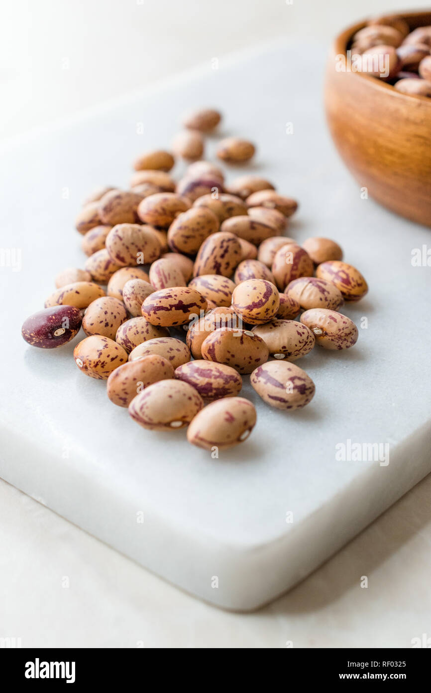 Raw Dry Pinto Beans on Marble Board / Kidney Beans. Organic Food Stock