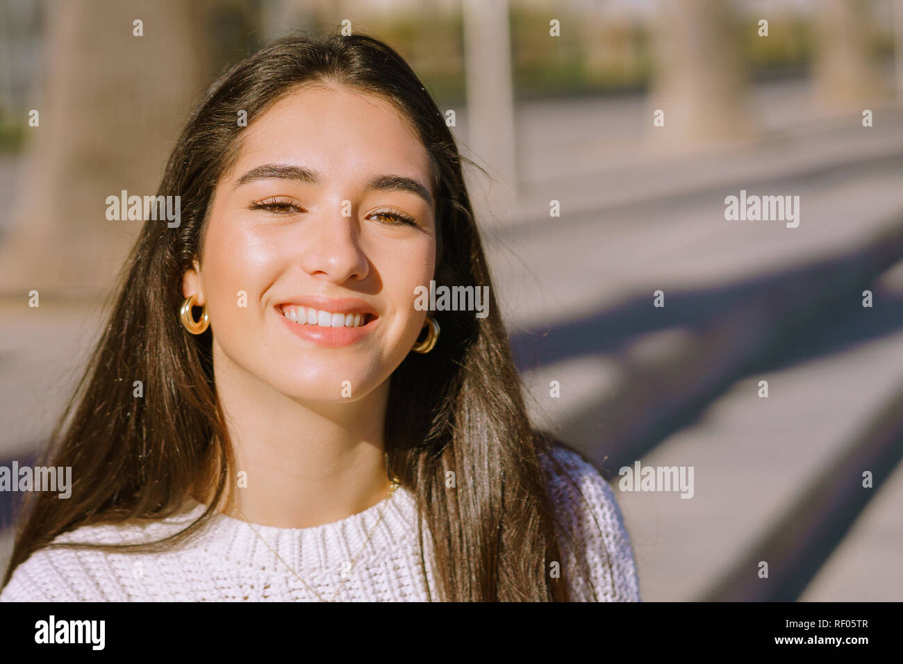 close-up Portrait of a happy smiling young girl - Image Stock Photo