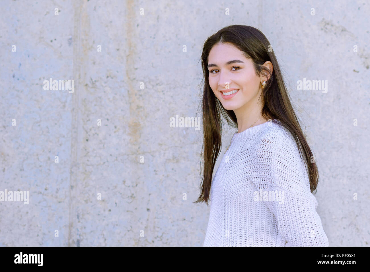 Portrait of a happy beautiful girl looking at camera - Image Stock ...