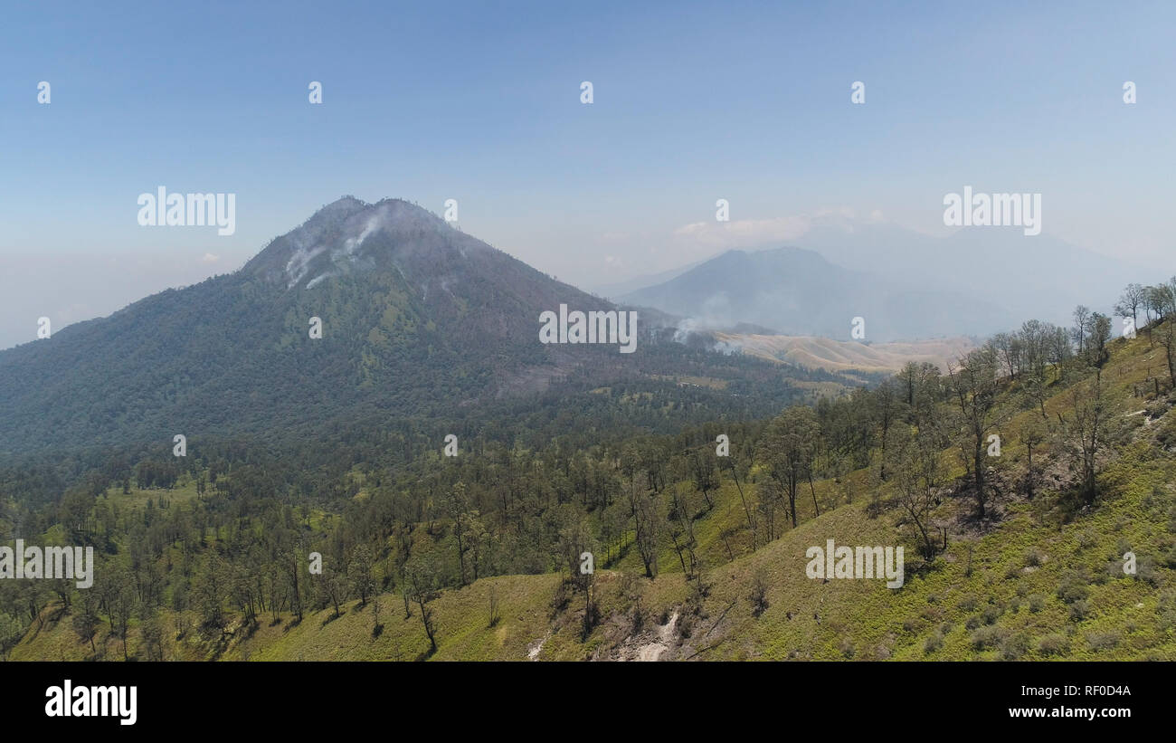 mountain landscape slopes mountains covered with green tropical forest ...