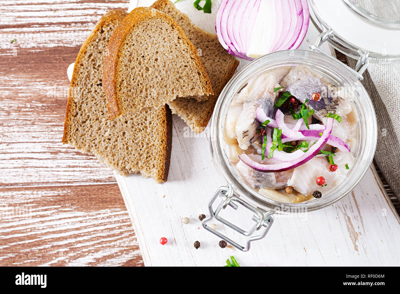 Marinated herring in jar with onions. Scandinavian food. Top view. Flat ...