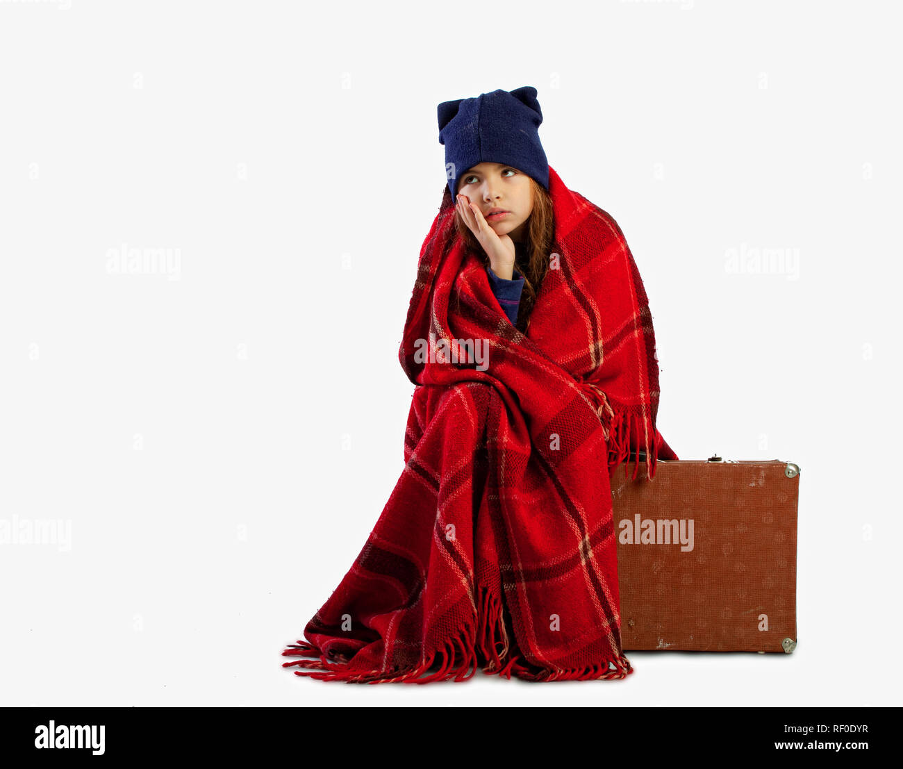 Portrait of young girl wrapped in blanket Cut Out Stock Images