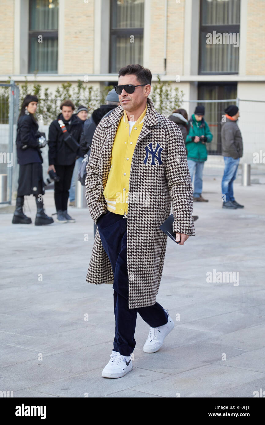 MILAN, ITALY - JANUARY 12, 2019: Alex Badia with white Nike shoes before  Neil Barrett fashion show, Milan Fashion Week street style Stock Photo -  Alamy