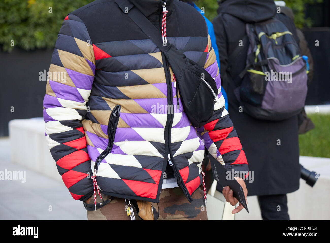 MILAN, ITALY - JANUARY 12, 2019: Man with geometric design padded jacket  before Neil Barrett fashion show, Milan Fashion Week street style Stock  Photo - Alamy
