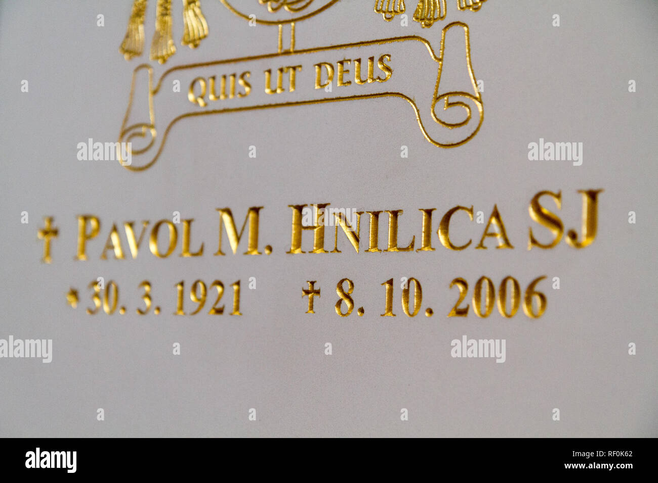 Trnava, Slovakia. 2018/4/12. The tombstone of the saintly bishop Pavol Hnilica with his motto: "Quis ut Deus?" meaning: ""Who [is] like God?". Stock Photo
