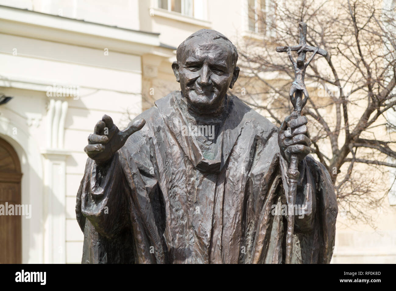 Trnava, Slovakia. 2018/4/12. A metal statue of Saint John Paul II in front of the Saint John the Baptist Cathedral. Stock Photo