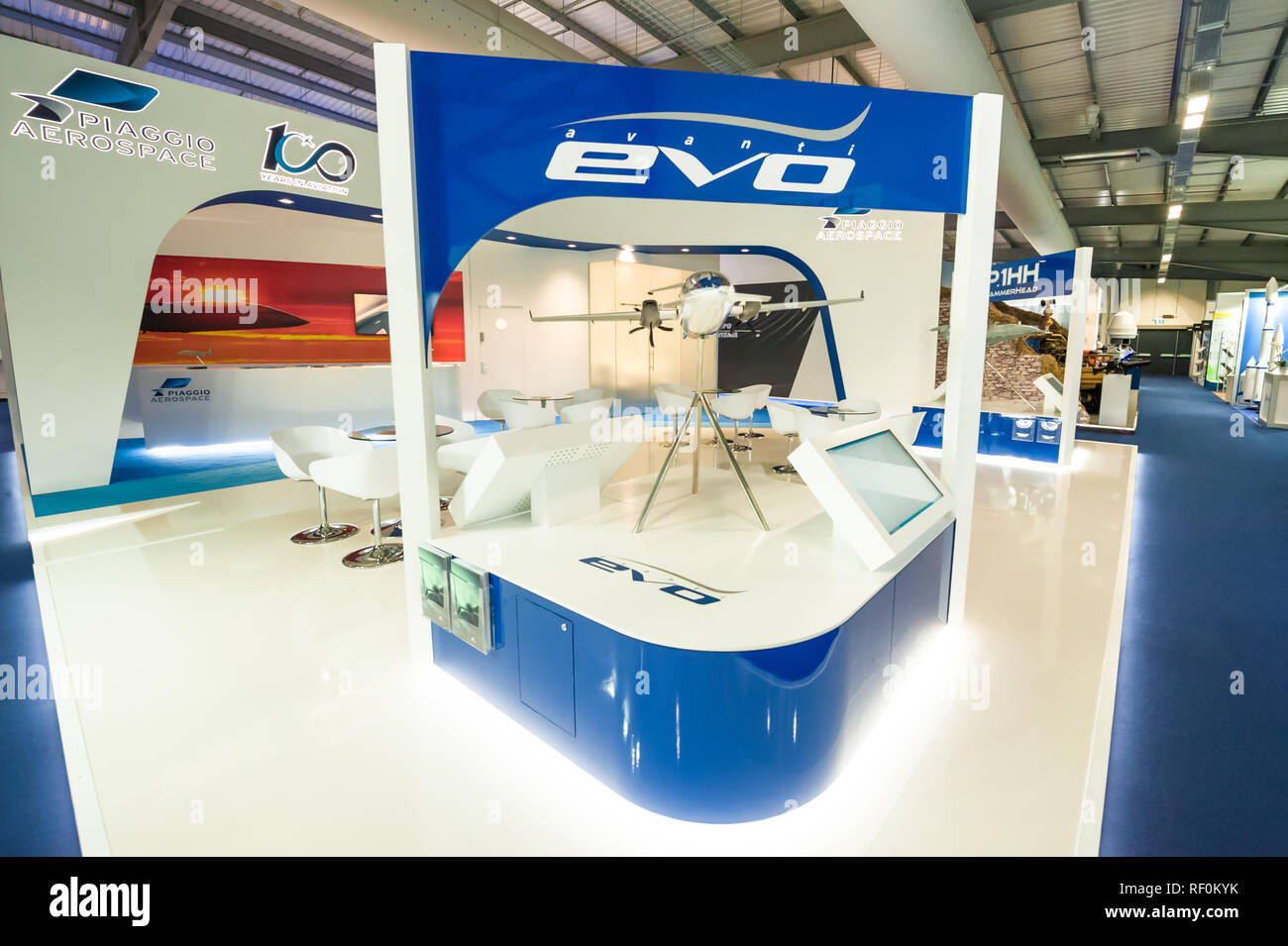 Farnborough, UK - July 20, 2018: Piaggio Aerospace business stand promoting the Avanti Evo aircraft range at a trade event in Farnborough, UK Stock Photo