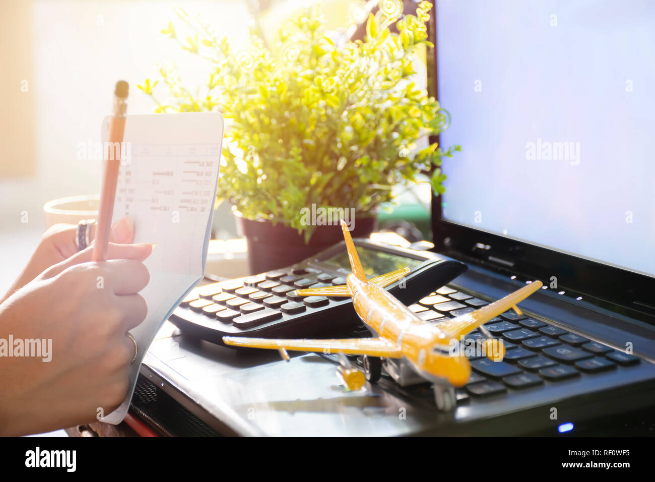 Planning vacation laptop map hi-res stock photography and images - Alamy