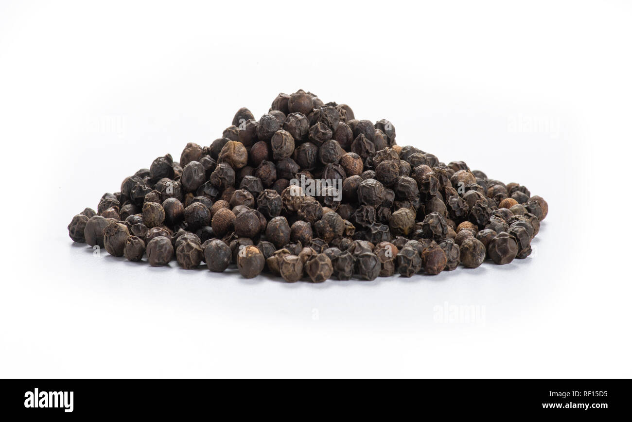 Pile of Whole Black Pepper Stock Photo