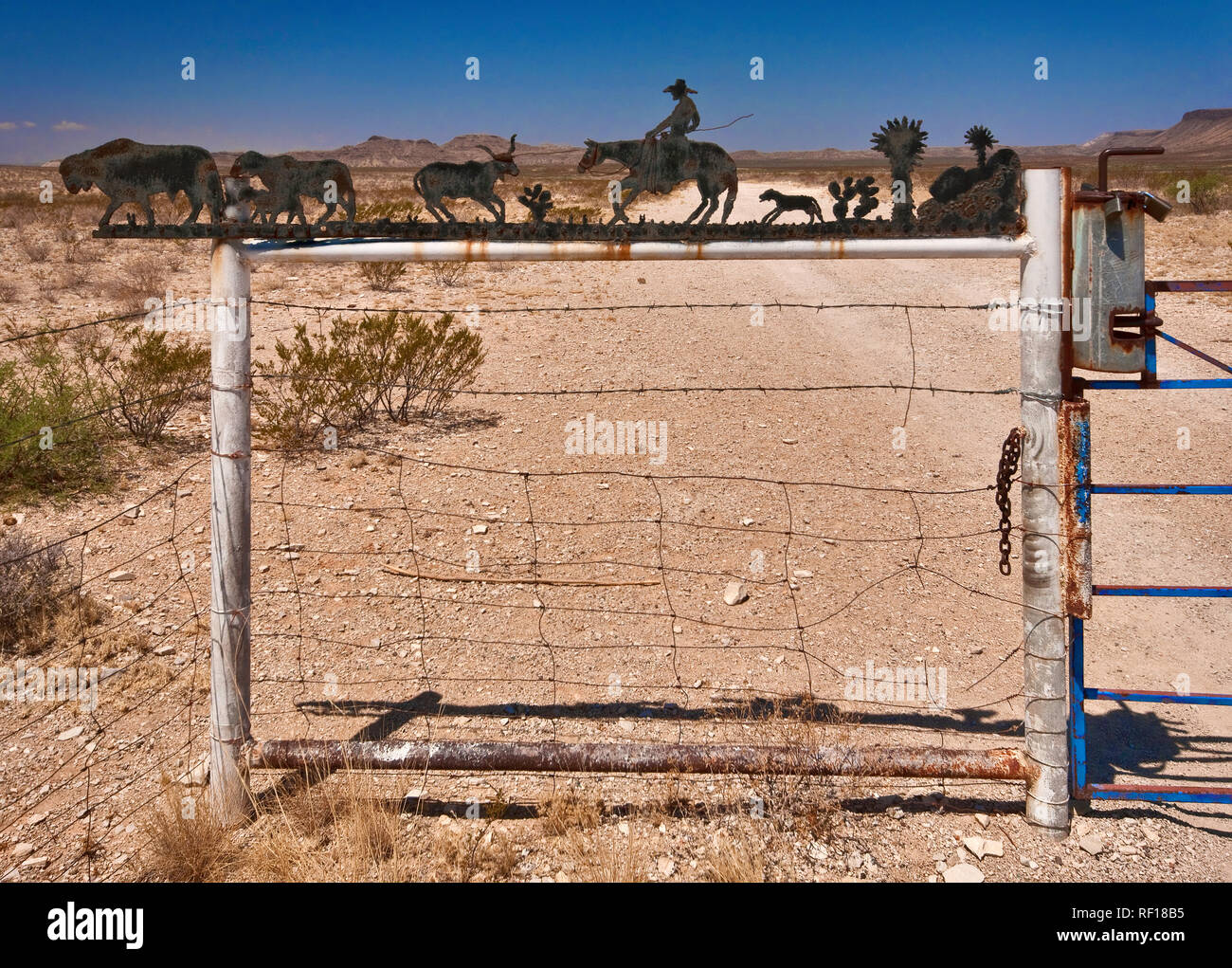 Wrought iron sign at ranch entrance in Chihuahuan Desert near Alpine ...