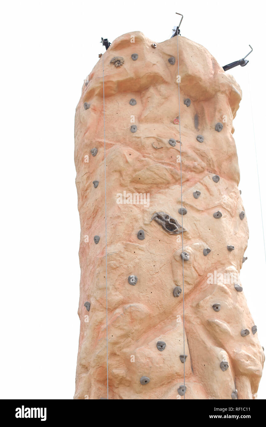 Climbing wall isolated with white background outdoor sport challenge activity. High extreme training Stock Photo