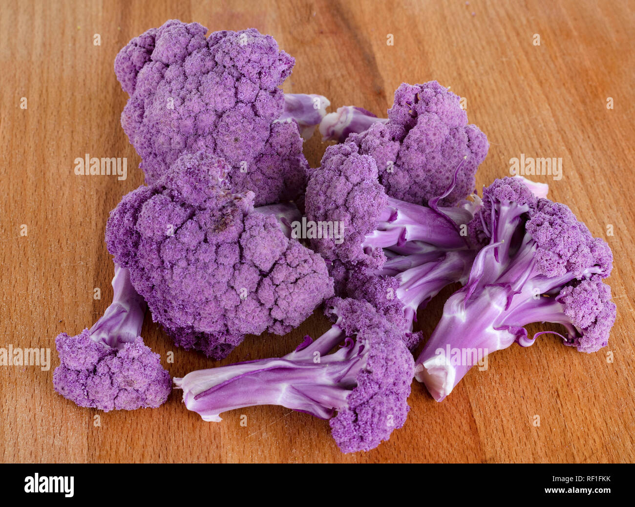 purple cauliflower cabbage in front of white background Stock Photo Alamy