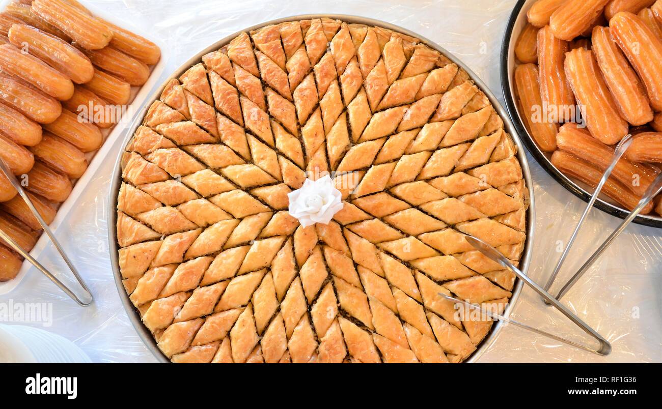platters of a turkish baklava and tulumba, image of a Stock Photo