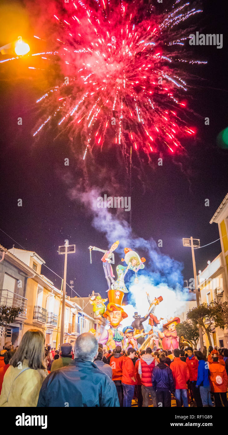 Cullera, Valencia / Spain - 02 17 2017: People watching fireworks celebration of the Falla Raval - the winner during Las Fallas festival in Valencia Stock Photo