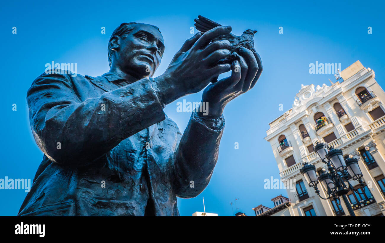 Madrid / Spain - 08 16 2017: Federico Garcia Lorca Spanish poet, playwright monument, sculpture at Plaza de Santa Ana or Saint Anne square in the lite Stock Photo