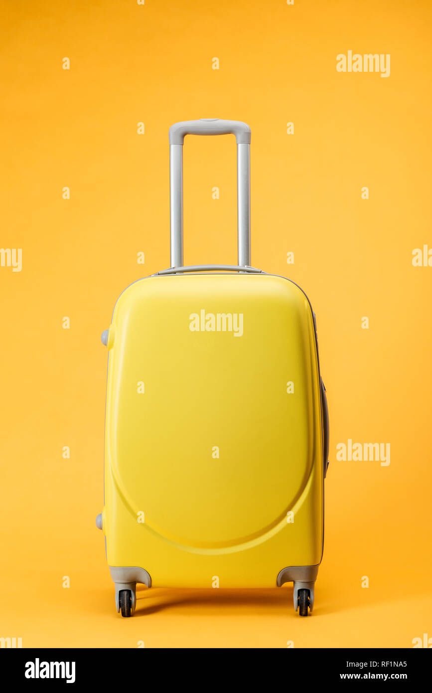 yellow carry on luggage