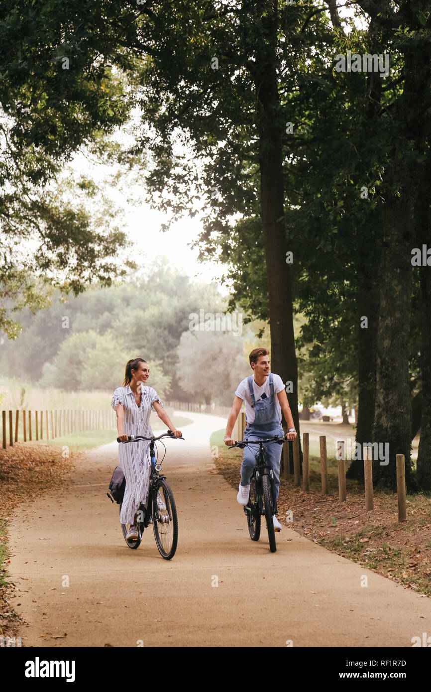 Young couple having a romantic date with bicycles Stock Photo