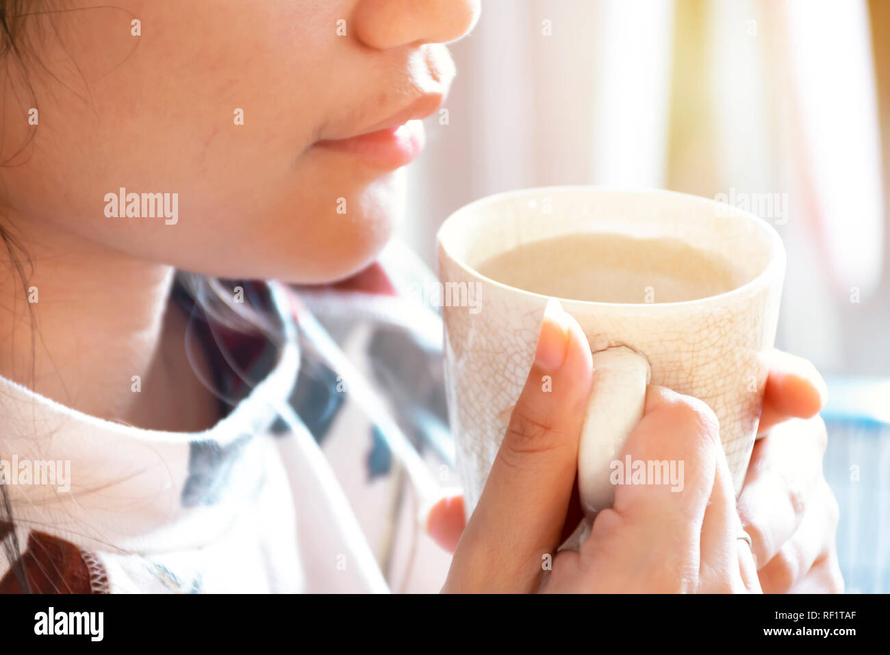 Women are drinking warm water, Water is very important to the human