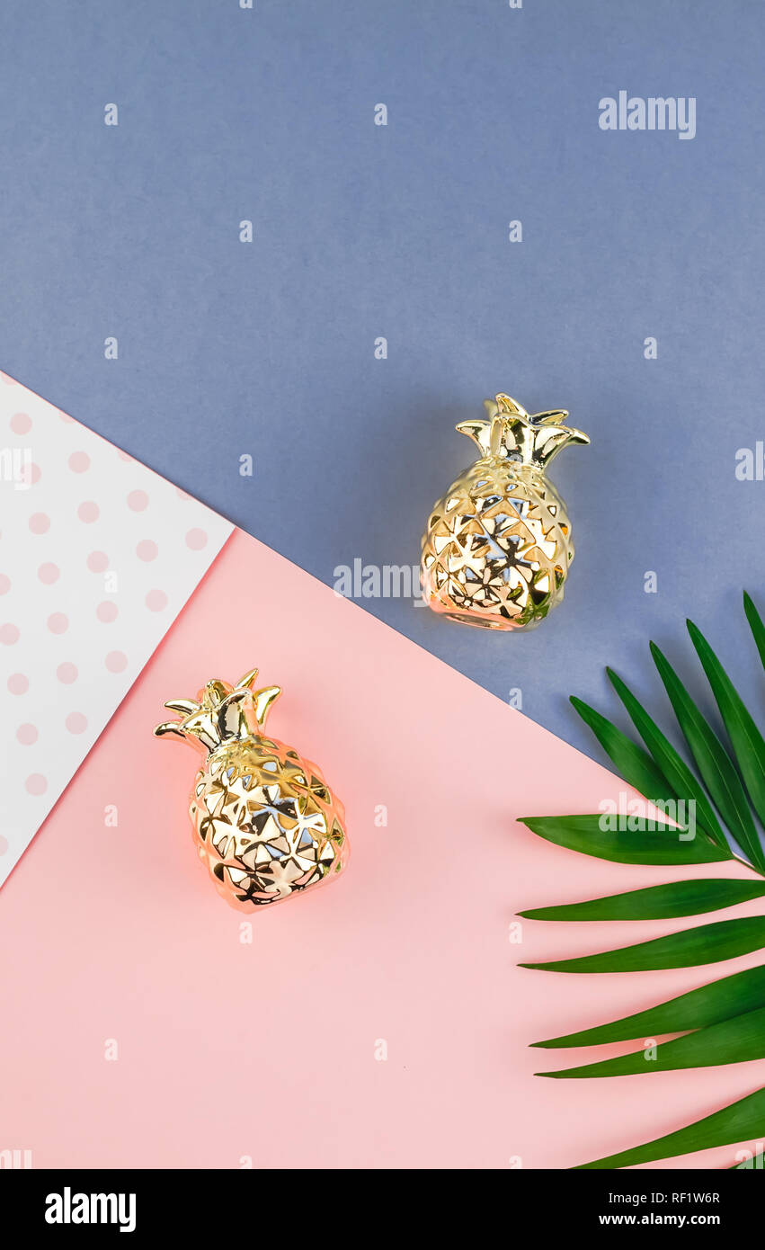 Creative flat lay top view of green tropical palm leaves on color paper ...
