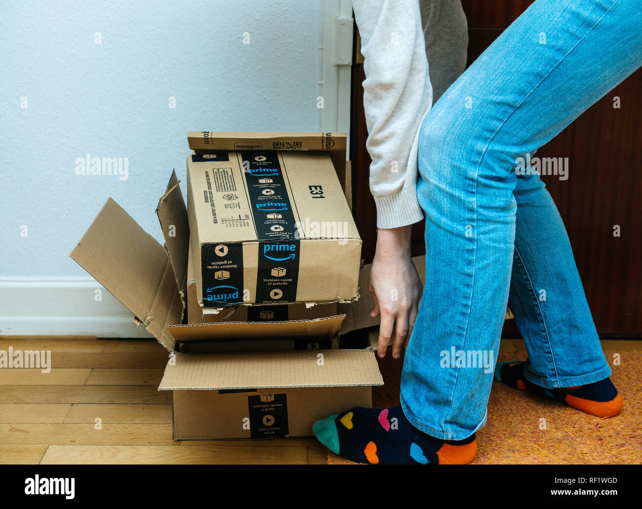 PARIS, FRANCE - JAN 13, 2018: Stack of Amazon Prime packages waste next  home door woman preparing to throw away to recycle the boxes Stock Photo -  Alamy