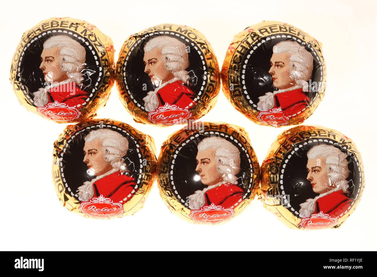 Mozartkugeln, Mozart balls, pralines filled with pistachio marzipan and nougat Stock Photo