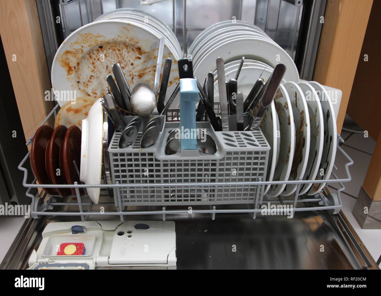 Dishwasher full of dirty dishes Stock Photo Alamy