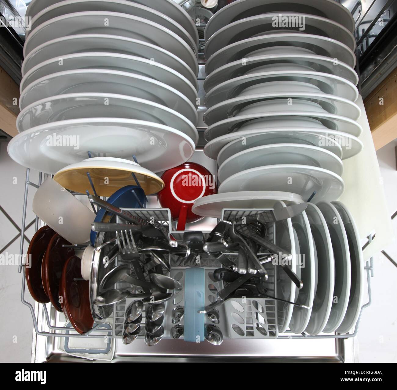 Clean dishes in dishwasher after a washing Stock Photo Alamy