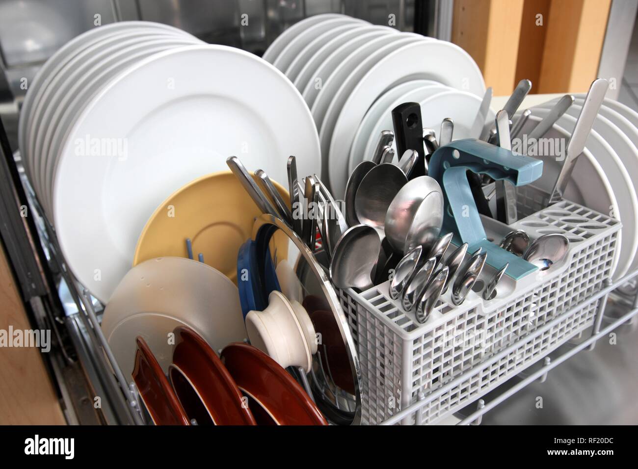 Clean dishes in dishwasher after a washing Stock Photo Alamy