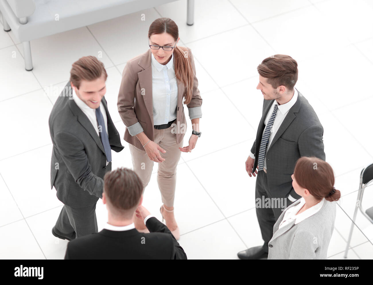 top view.business team talking standing in the office Stock Photo - Alamy