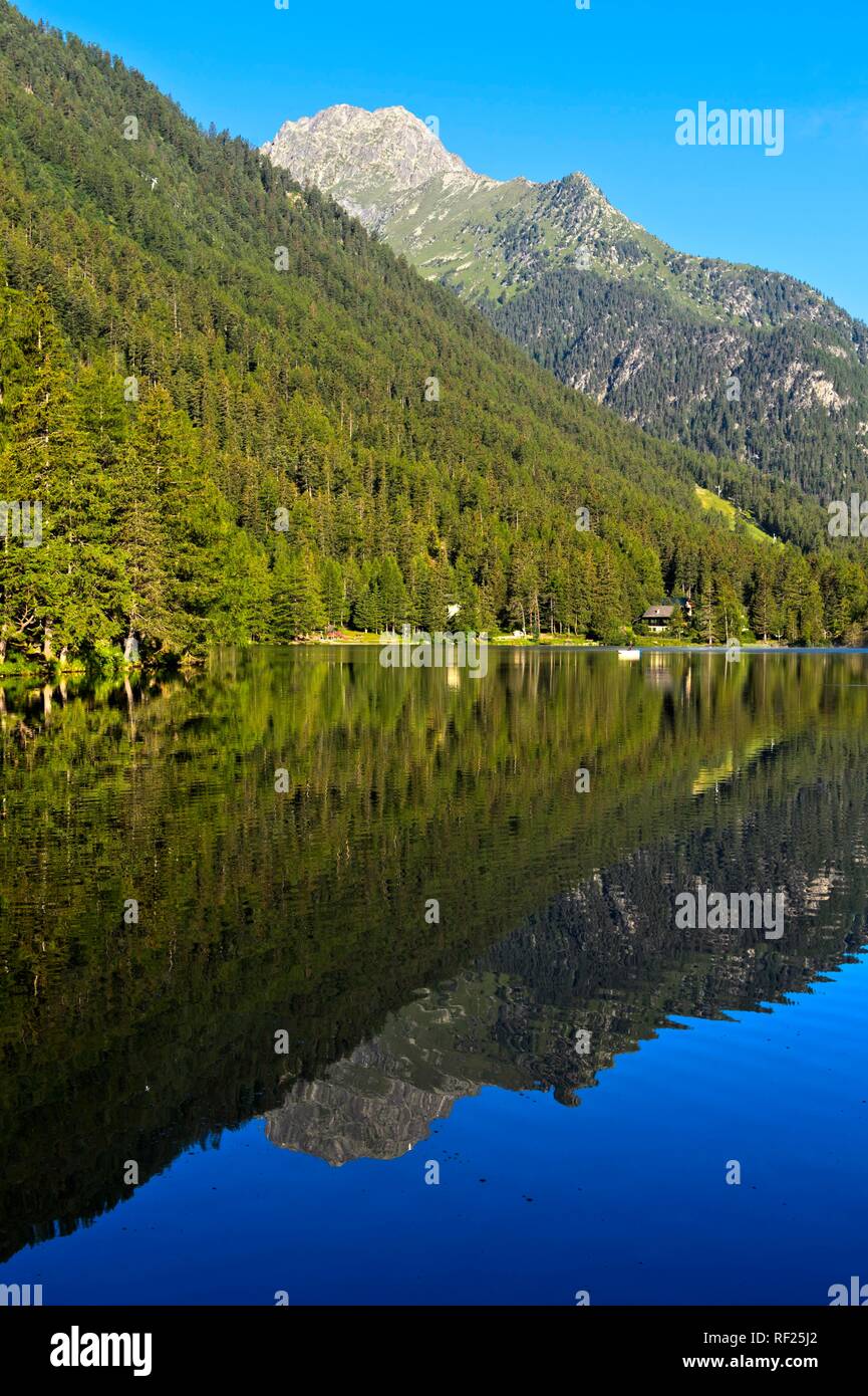 Mountain lake Lac de Champex with mirroring, Champex-Lac, Valais, Switzerland Stock Photo
