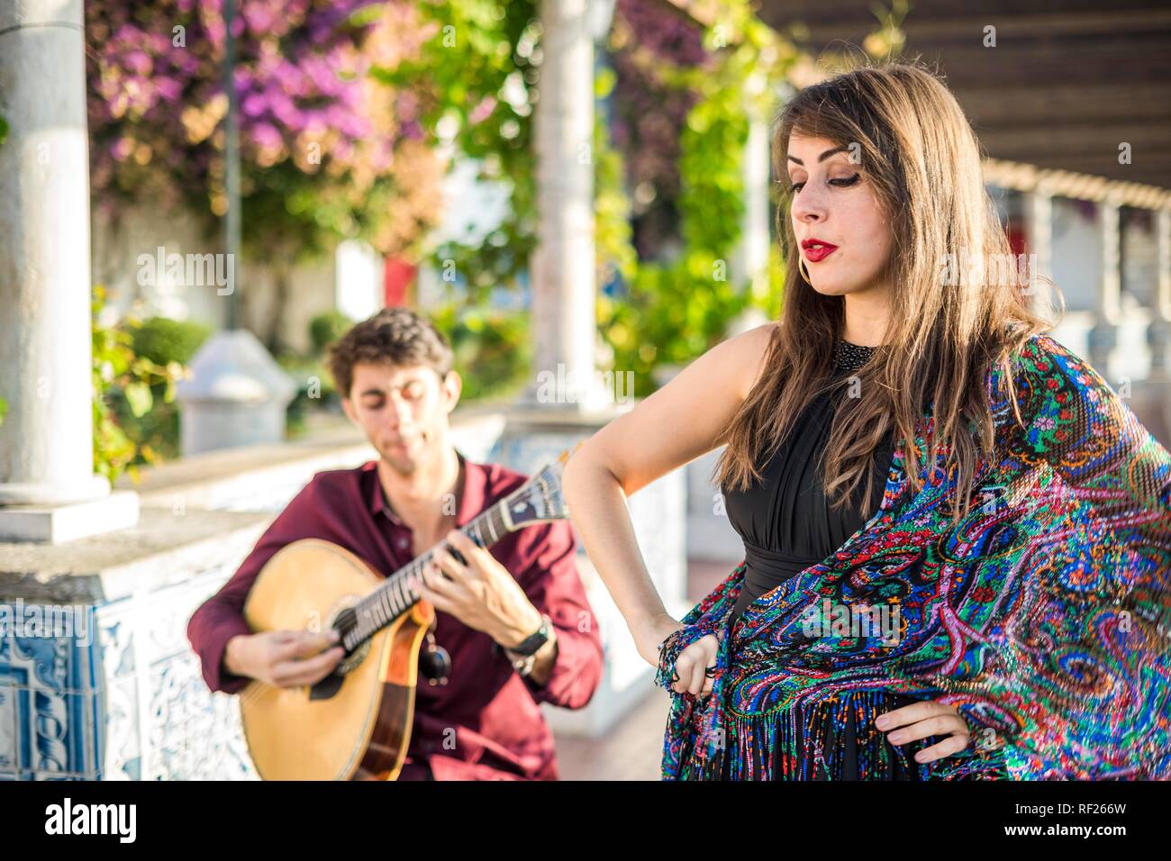 Band performing traditional music fado under pergola with portuguese tiles called azulejos in Lisbon, Portugal Stock Photo