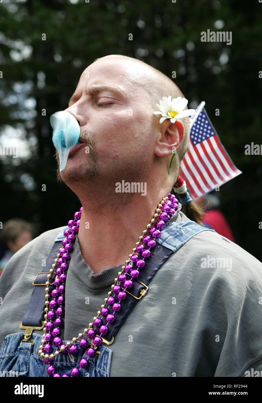 Bubblegum blowing competition during Fourth of July celebrations