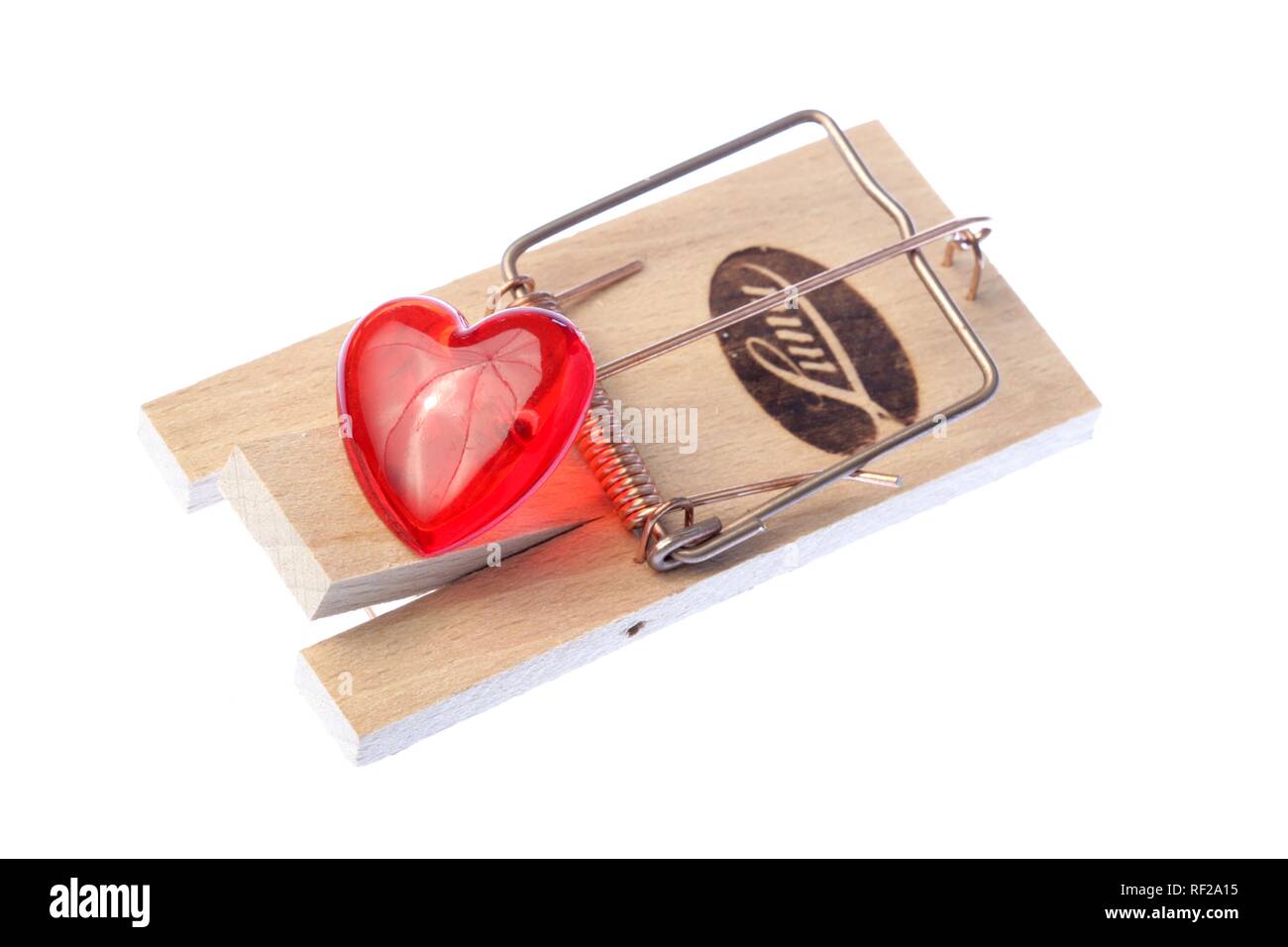 https://c8.alamy.com/comp/RF2A15/symbolic-shot-heart-caught-in-a-mousetrap-love-trap-RF2A15.jpg