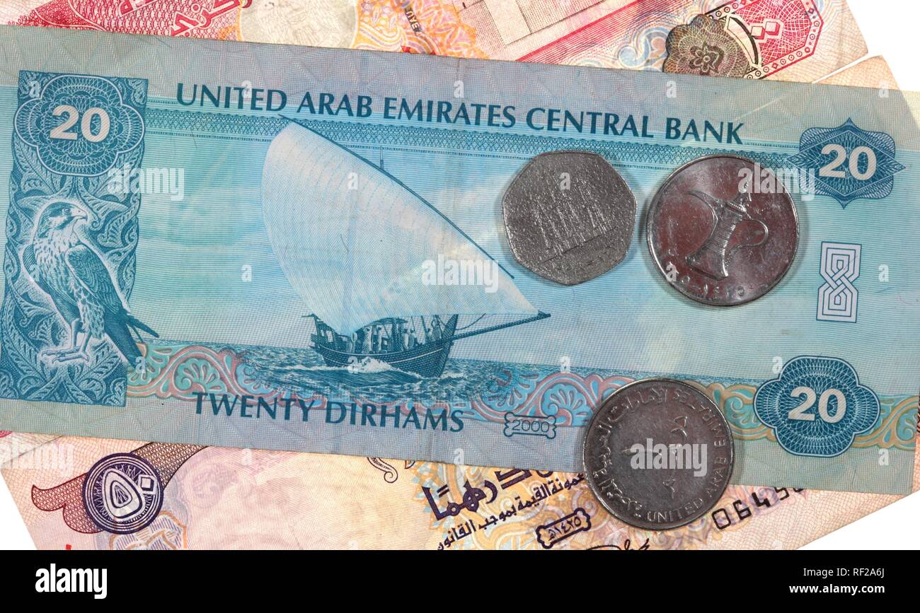 Dirham (or Dirhem) currency, AED, bills and coins featuring oil rig, oil derrick, United Arab Emirates, UAE Stock Photo