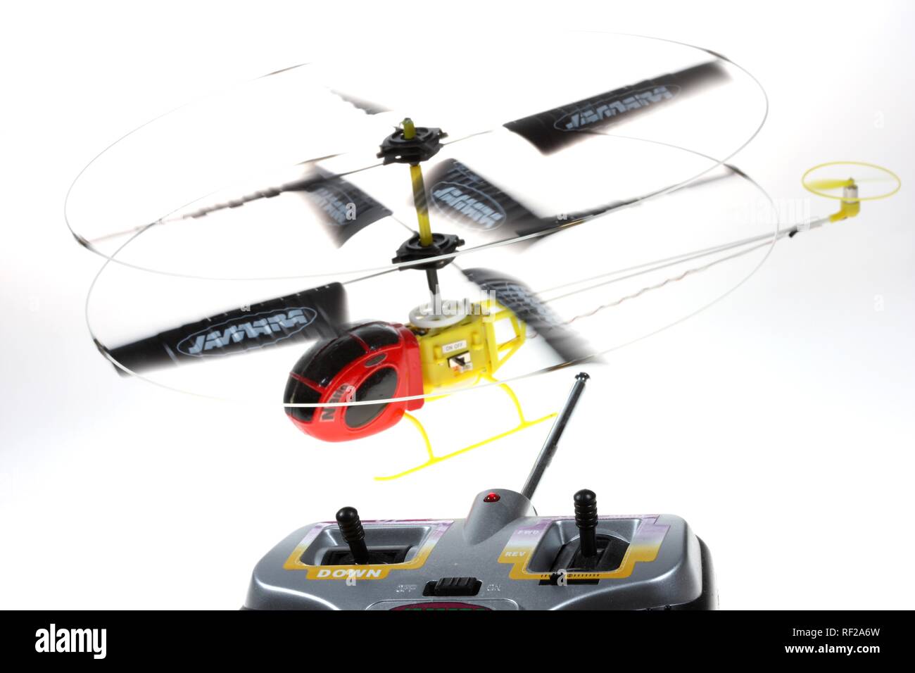 Remote controlled toy helicopter, minature model flown indoors Stock Photo
