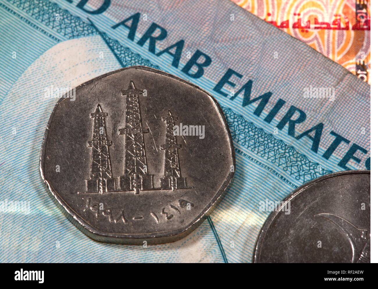 Dirham, AED, coin featuring oil tower motif, United Arab Emirates or UAE currency Stock Photo