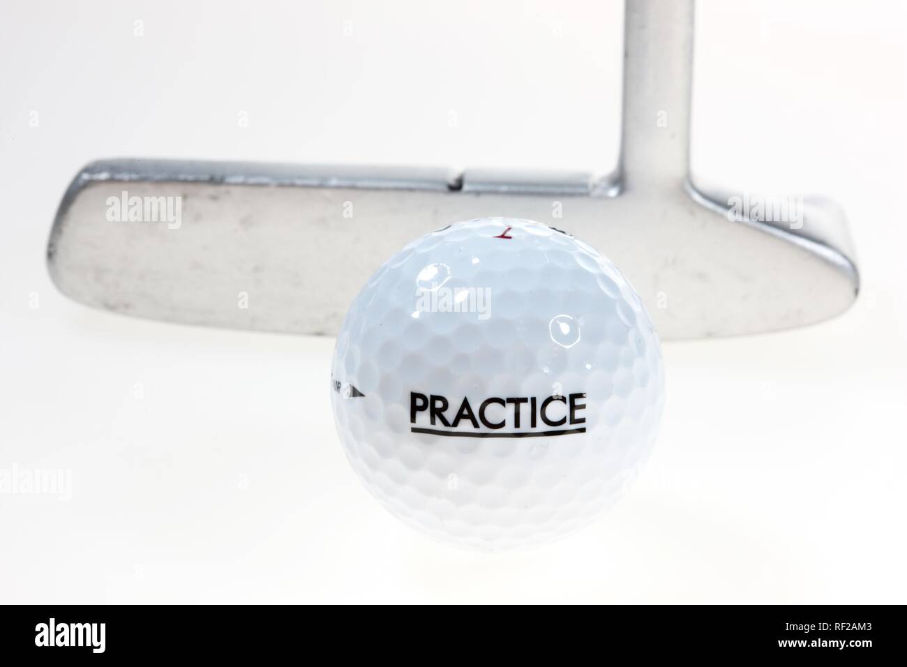 Golf ball, practice ball for the driving range, putter to cup on the