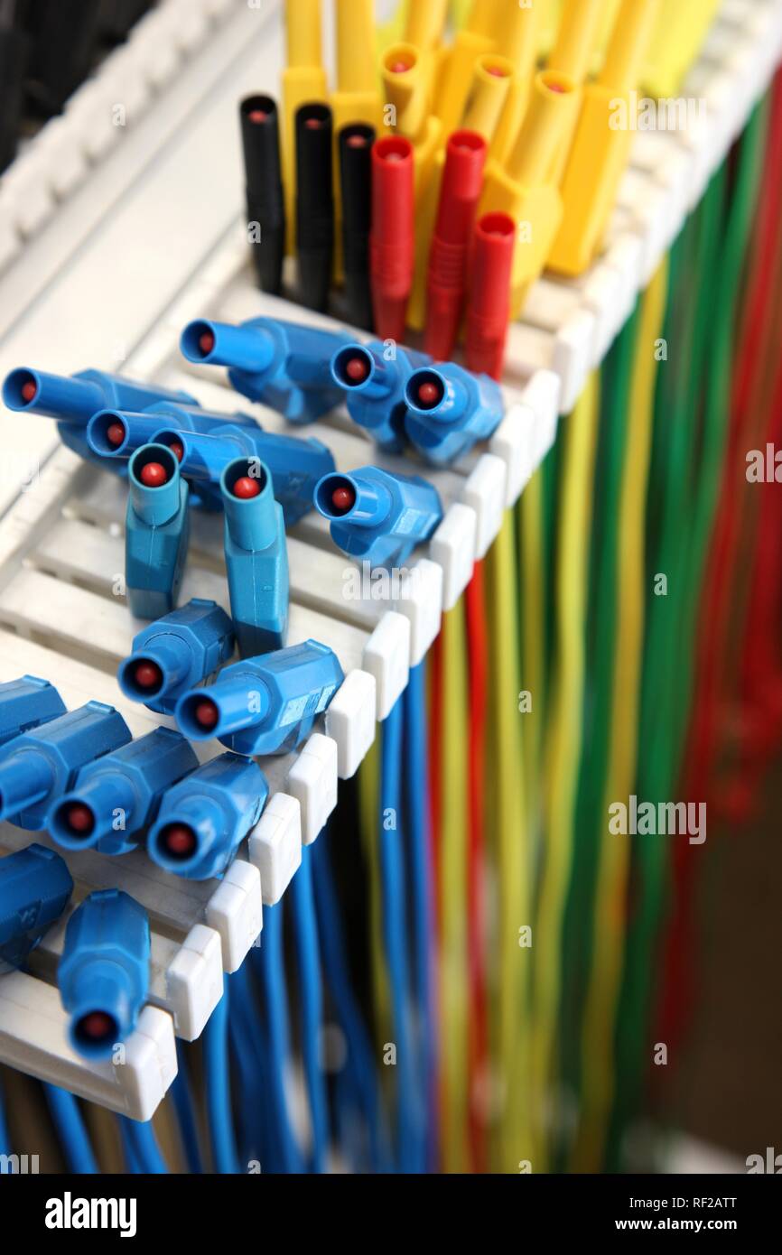 Cables in various colours for connecting electric circuits Stock Photo
