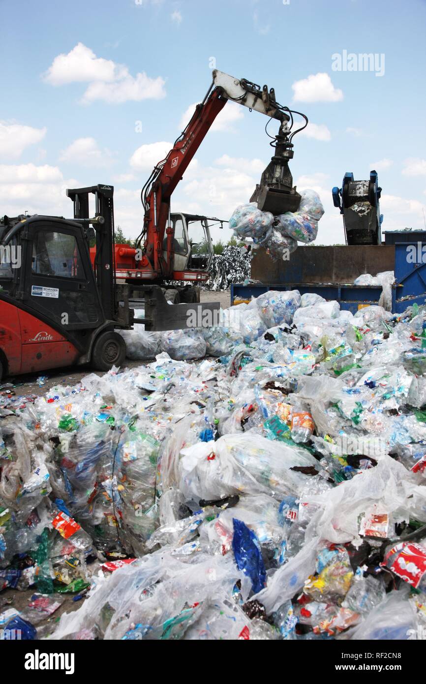 Plastic recycling, PET bottles and plastic rubbish are shredded and