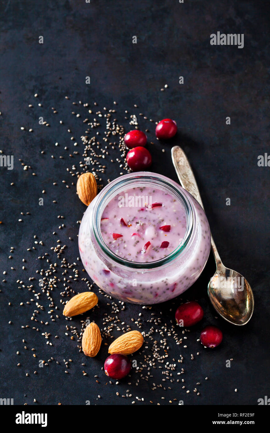 Dessert of chia seeds, almonds and cranberries Stock Photo