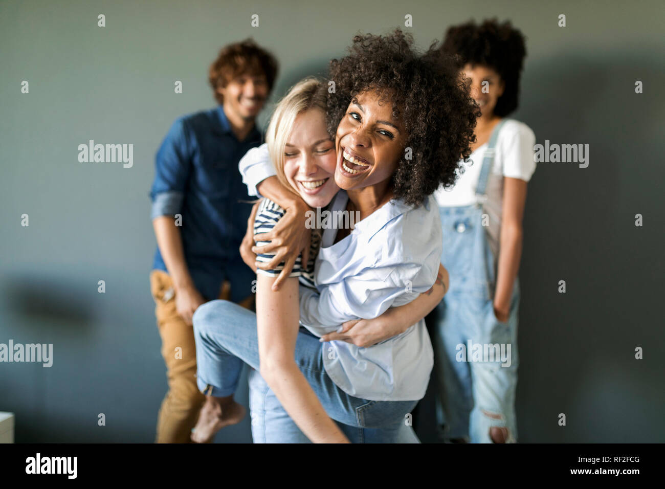 Two women hugging hi-res stock photography and images - Alamy