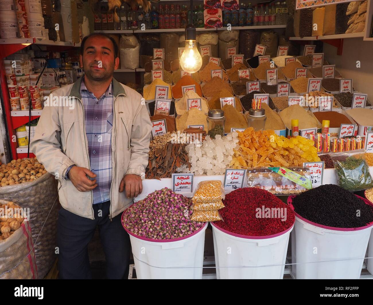 Dealer at spice stall at the market of Kermanshah, Iran Stock Photo Alamy